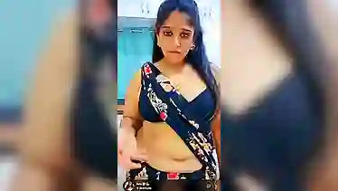 Mature Indian Anu Tango strips and teases with her massive ass & tits